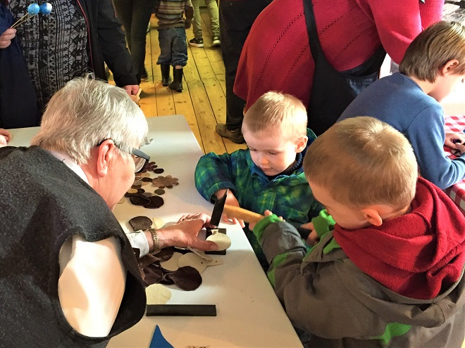 Making a leather keychain for Easter at Håndværksmuseet in Randers Denmark