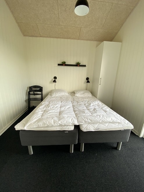 adult-bedroom-in-cabin-at-lalandia-sondervig-hytter-in-denmark
